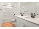 Bathroom with double sink vanity, modern fixtures, and tile flooring at 3629 Sublett Loop, Tavares, FL 32778