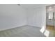 Bright bedroom featuring a large closet and ensuite bathroom for convenience and privacy at 3629 Sublett Loop, Tavares, FL 32778
