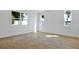 Bright and airy living area with tile floors, ample natural light, and a contemporary design at 3629 Sublett Loop, Tavares, FL 32778