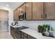 Well-equipped kitchen with stainless steel appliances and ample counter space at 3723 Malad Way, Tavares, FL 32778