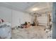 The garage includes the water heater, washer, dryer, and has lots of open storage space at 42 Chip Ct, Kissimmee, FL 34759