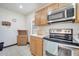View of oven/microwave area of the kitchen at 42 Chip Ct, Kissimmee, FL 34759