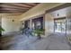 Covered porch with outdoor seating, providing ample space for relaxing and entertaining at 42 Chip Ct, Kissimmee, FL 34759