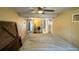 Spacious main bedroom with an ensuite bathroom featuring an attached air conditioning unit at 4218 Drexel Ave, Orlando, FL 32808