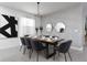 Elegant dining area featuring a dining table with seating, and contemporary decor at 4290 Paragraph Dr, Kissimmee, FL 34746