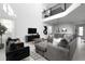 Bright living room featuring modern decor, comfortable seating, and lots of natural light at 4290 Paragraph Dr, Kissimmee, FL 34746
