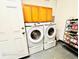 Convenient laundry room with modern Samsung washer and dryer at 467 Martigues Drive, Kissimmee, FL 34759