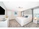 Serene bedroom with ceiling fan, modern decor and ample natural light at 4832 Dedication St, Kissimmee, FL 34746