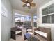 Inviting outdoor patio with comfortable seating overlooking the private screened-in pool at 4832 Dedication St, Kissimmee, FL 34746