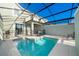 Private screened-in pool area, perfect for relaxation and outdoor enjoyment at 4832 Dedication St, Kissimmee, FL 34746