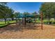 Fun community playground with swings, slides, and a covered play area at 501 Pheasant Dr, Haines City, FL 33844
