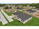 Aerial view of a single-Gathering home in a well-maintained residential community at 555 Viceroy Ct, Kissimmee, FL 34758