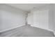 Spacious bedroom featuring plush carpet flooring and a large closet for ample storage at 555 Viceroy Ct, Kissimmee, FL 34758