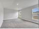 Spacious bedroom with plush carpeting and double windows offering natural light at 555 Viceroy Ct, Kissimmee, FL 34758