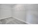 Walk-in closet with wire shelving and plush carpeting at 555 Viceroy Ct, Kissimmee, FL 34758