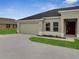 Charming single-Gathering home with an attached two-car garage and well-kept landscaping at 555 Viceroy Ct, Kissimmee, FL 34758