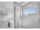 Glass enclosed shower with tile surround in bathroom at 555 Viceroy Ct, Kissimmee, FL 34758