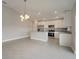 Modern kitchen with stainless steel appliances, ample cabinet space, and an island at 557 Viceroy Ct, Kissimmee, FL 34758