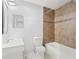 Cozy bathroom featuring a tiled shower and vanity with ample lighting at 6548 Swissco Dr # 61, Orlando, FL 32822