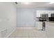 Bright eat-in kitchen featuring granite countertops and white appliances at 6548 Swissco Dr # 61, Orlando, FL 32822