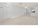 Open-concept living room featuring tile floors and a neutral color palette at 6548 Swissco Dr # 61, Orlando, FL 32822