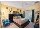 Bright and cheerful bedroom with colorful decor, a comfortable bed, and ample natural light at 7521 Pellham Way, Kissimmee, FL 34747
