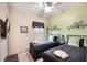 Bedroom with two twin beds, a nightstand, and a TV at 7521 Pellham Way, Kissimmee, FL 34747