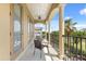 Outdoor balcony with seating area offering a view of the surrounding landscape at 781 Golden Bear Dr, Kissimmee, FL 34747