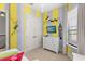 Charming bedroom featuring whimsical Peter Pan themed wall decor and a double door closet at 781 Golden Bear Dr, Kissimmee, FL 34747