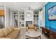 Bright living room showcases a fireplace with built-in shelves, neutral paint, and ample seating at 781 Golden Bear Dr, Kissimmee, FL 34747