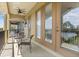 Covered patio featuring outdoor seating and serene views at 781 Golden Bear Dr, Kissimmee, FL 34747