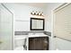 Clean bathroom featuring a shower, toilet, and a stylish vanity with a dark wood finish at 847 Orista Dr, Davenport, FL 33897