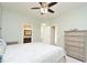 Well-lit bedroom with ensuite bathroom and an open closet, perfect for a primary suite at 847 Orista Dr, Davenport, FL 33897