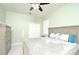 Comfortable bedroom with a ceiling fan, neutral paint, and plush carpeting at 847 Orista Dr, Davenport, FL 33897