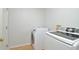 Bright laundry room featuring a new Samsung washer and dryer on light colored floors at 847 Orista Dr, Davenport, FL 33897