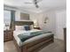 Bedroom featuring a ceiling fan, natural light, and soft, neutral tones and decor at 9118 Sommerset Hills Dr, Davenport, FL 33896
