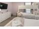 Bedroom offering bunk beds and a twin bed, light and bright, and neutral tones at 9118 Sommerset Hills Dr, Davenport, FL 33896