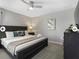 Comfortable bedroom featuring a stylish design and a ceiling fan at 9118 Sommerset Hills Dr, Davenport, FL 33896
