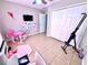 room is equipped with personal play/study center and decorated with artwork at 467 Martigues Drive, Kissimmee, FL 34759