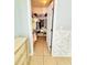 Well-organized walk-in closet with shelving and hanging space offers plenty of room for clothes and storage at 467 Martigues Drive, Kissimmee, FL 34759