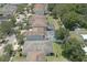 This aerial view shows the neighborhood layout, highlighting the homes and green spaces in the community at 1043 Tourmaline Dr, Kissimmee, FL 34746