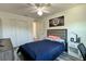 Bedroom featuring neutral walls, ceiling fan, and plank flooring at 1043 Tourmaline Dr, Kissimmee, FL 34746