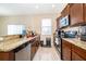 Kitchen featuring granite countertops, stainless steel appliances, breakfast bar, and neutral finishes at 10733 Savannah Landing Cir, Orlando, FL 32832