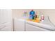 The laundry room is equipped with a modern washer and dryer set at 10733 Savannah Landing Cir, Orlando, FL 32832