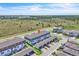 Aerial view of townhomes, showcasing the community and surrounding landscape at 12190 Plumpton Dr, Winter Garden, FL 34787