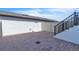 Paver patio with access to the building via steps and white fence offering privacy at 12190 Plumpton Dr, Winter Garden, FL 34787