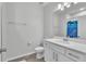 Clean and modern bathroom with white cabinets, quartz countertop, and shower/tub combination at 12190 Plumpton Dr, Winter Garden, FL 34787