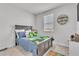 Bedroom with a bed with blue comforter with a Minecraft themed decor at 12190 Plumpton Dr, Winter Garden, FL 34787