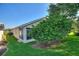Home with screened in porch in the backyard and tree at 124 Ashton Dr, Davenport, FL 33837