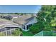 Exterior backyard of home featuring screened-in porch at 124 Ashton Dr, Davenport, FL 33837